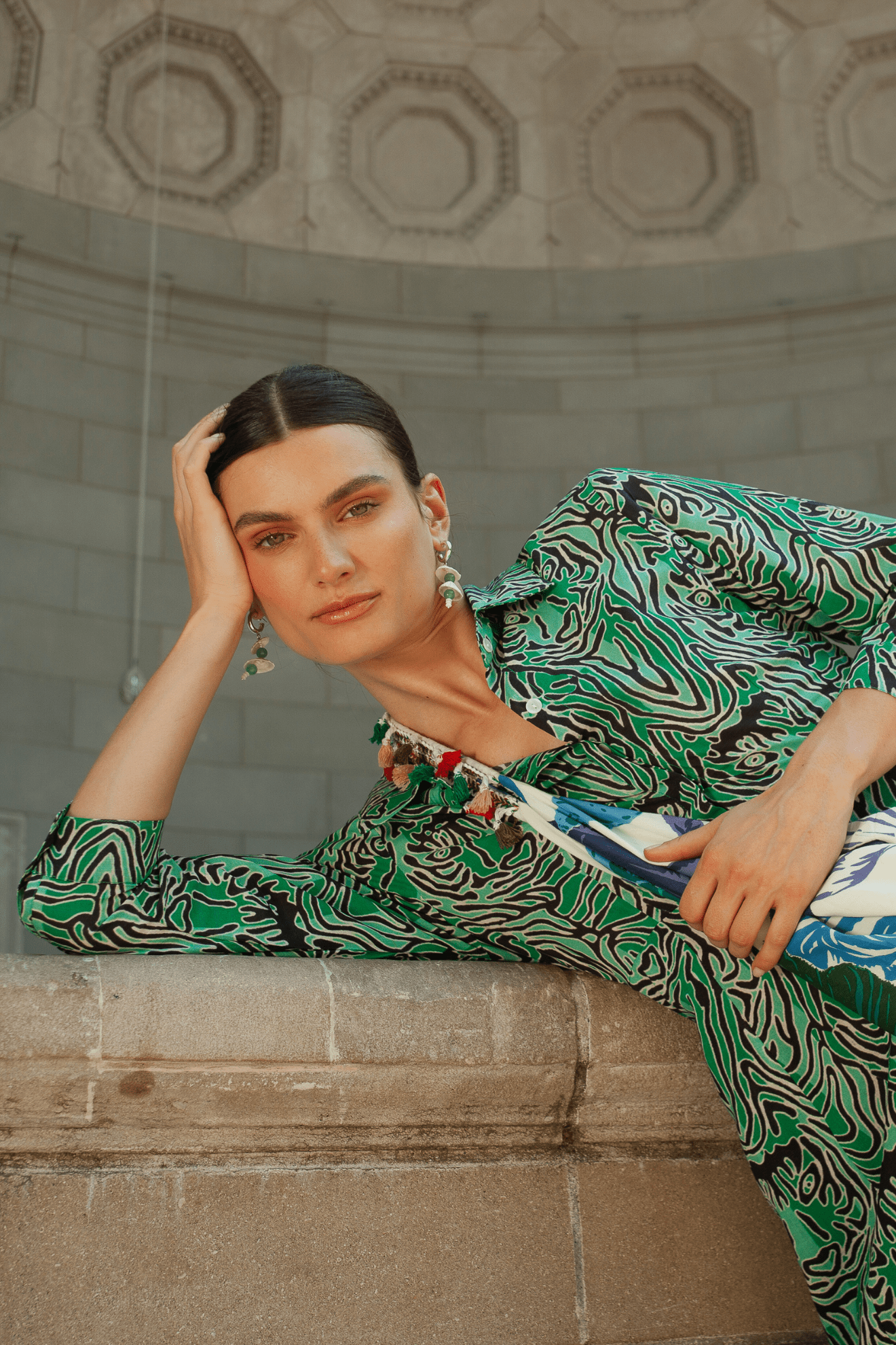 Model wearing a light bohemian-style dress by Guadalupe Design.