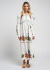 Sofia Parrot Dress, showcasing its tropical parrot design.